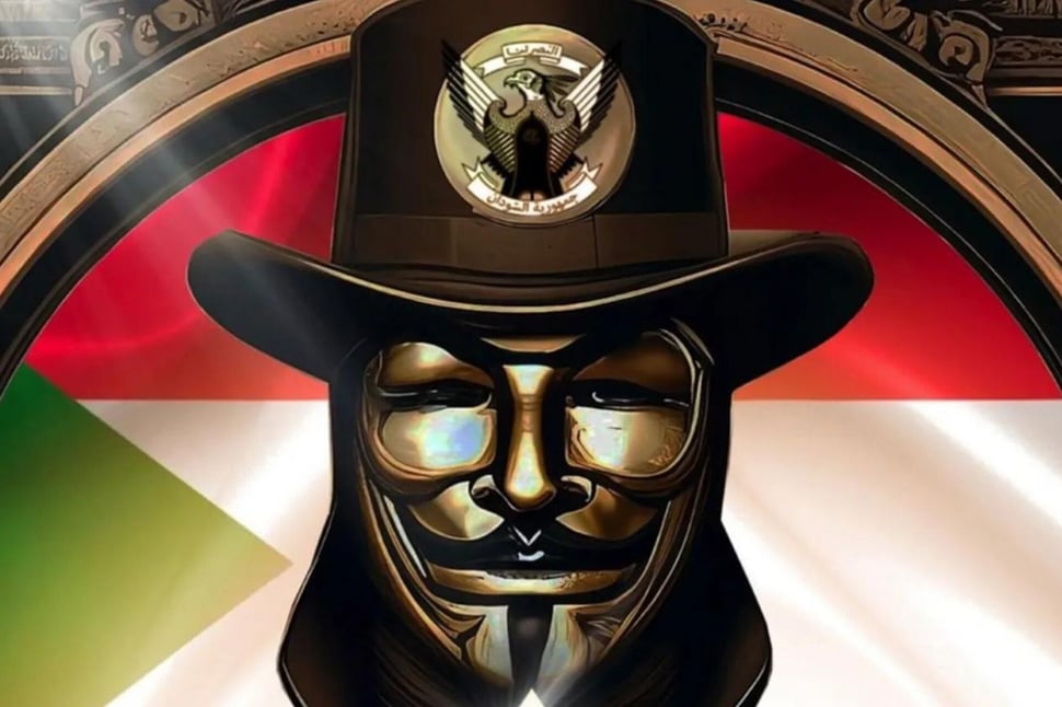 Een gemaskerd figuur met de vlag van Sudan, het symbool van 'Anonymous Sudan' de hackergroep verantwoordelijk voor de cyberaanval op SAS.